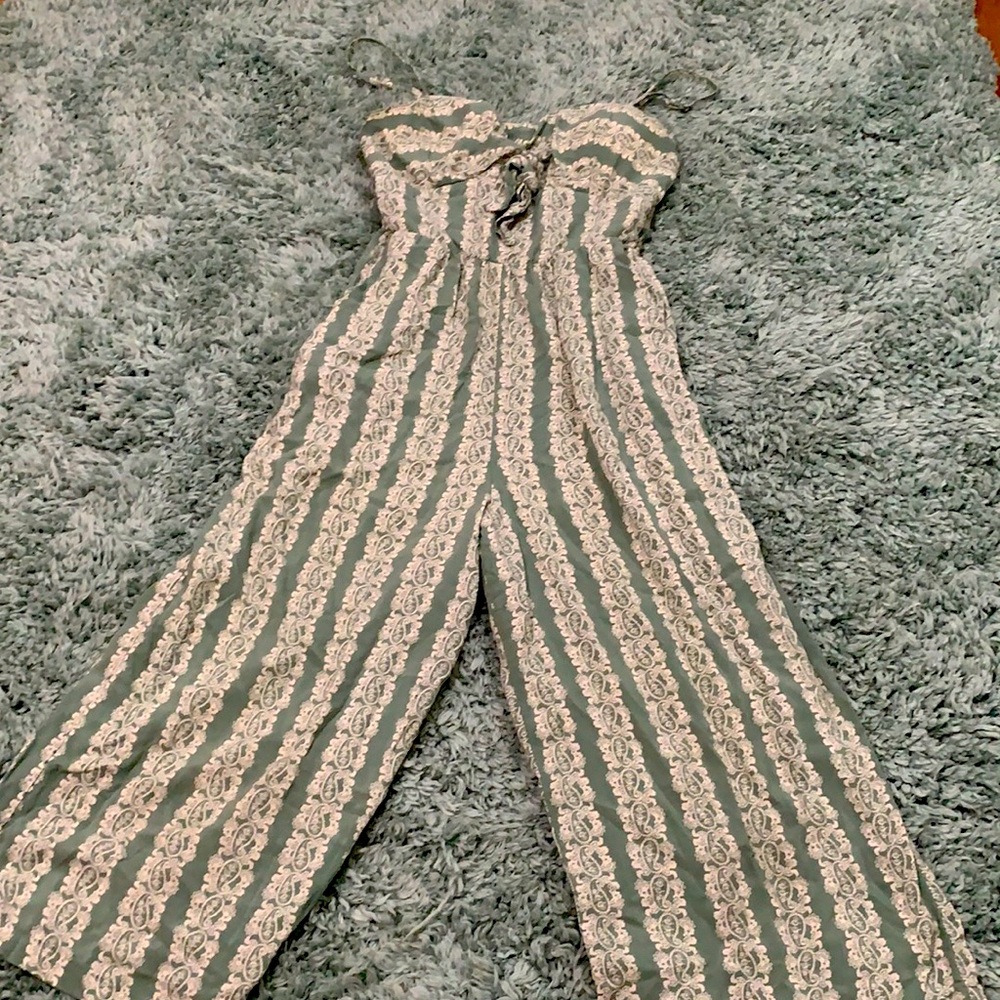 Teal striped floral print romper with knot on bodice